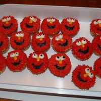 Elmo Cupcakes For my 2 year old's party at school. Red buttercream...I know, the parents were really happy with me!!! :) but the kids loved them!