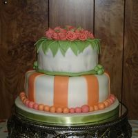 Se263095_2.jpg Top layer was yellow cake with raspberry filling, the bottom layer was devil's food with a cheesecake filling. All decorations are...