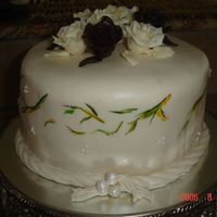 Lis Birthday I made this cake for my daughter birthday .It's cream cheese cake, decorated with fondant and chocolate rose.