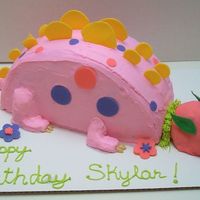 Pink Dinosaur Buttercream with fondant accents.