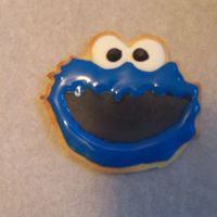 Cookie Monster Cookie I am making this as party favors for my nieces third birthday. This is my second time making cookies and first time with royal icing. They...
