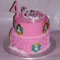 Princess Birthday Cake Covered in BCF with chocolate and fondant accents. I had to cheat with the crown as I had such a hard time with a royal icing one. Oh well...
