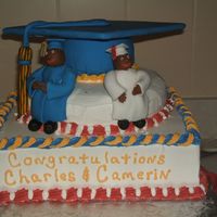 Graduation The figures on this cake are made of fondant. The hat is also covered in fondant the rest of the cake is buttercream.