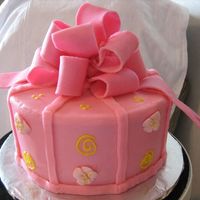Pink Gift Cake Bow is made out of gumpaste, covered in BC icing.