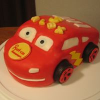 Lightning Mcqueen Covered in fondant with fondant accents.