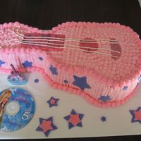 Hannah Montana Hannah Montana guitar cake, all buttercream with some fondant accents.
