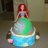 Little Mermaid I have seen a lot of these on CC, but was excited to try it myself! This is my first doll cake and I am pretty happy with how it turned out...