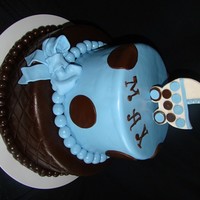 Brown & Blue 12" round double layer bottom, 8" round double layer top. Covered in MMF with MMF and gumpaste accents.