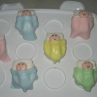 Baby Blanket Cupcakes Cupcakes made with the pre-tinted fondant for my sister in law's baby shower.