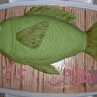 Fish Cake yellow cake, buttercream, fondant. used pictures from this site for inspiration; also followed C. Peters' directions for her fish cake...