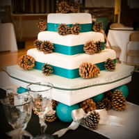 Square Wedding Cake My first square cake. Honestly it was much harder to make than a round cake, but I loved how smoothly the fondant went on. I made it for my...