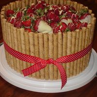 Dsc03052_00.jpg White cake with strawberry cream filling (I got this filling recipe on CC, it was posted by nickshalfpint). Buttercream frosting on cake,...