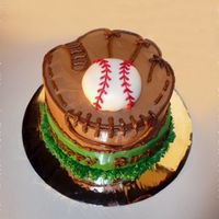 Baseball Glove All buttercream except the fondant around the baseball. This one was fun!