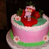 Strawberry Shortcake Made this for my daughter's 3rd b-day. Whip cream with sprayed pink/green coloring.