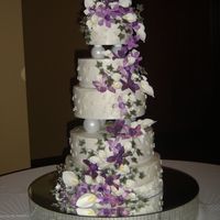 Plum Orchid This is a wedding cake I made for my brothers wedding in late July. All of the orchids and ivy are hand painted to match the bridesmaids...