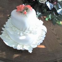 Suprise Wedding Cake I tricked a friend of mine to pick her own wedding cake. She was getting remarried, just a jop and i wanted to surprise her. So i told her...