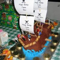 Pirate Ship 3-D Cake My second attempt at a pirate ship cake. Much easier and looksbetter than the first one! The birthday boy loved it.