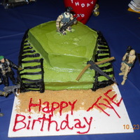 Army Tank Cake BC yellow cakes with army figurines. Definitely not my best work, but it was fun making it.