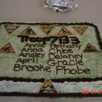 Girl Scout Ceremony Cake BC cake with fondant "badges". These were the badges that our troop had received within the year.