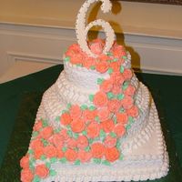 6Th Anniversary Cake - Cascading Roses My sister-in-law and I made this cake for the 6th Anniversary Celebration for her company. It was white cake with buttercream frosting.