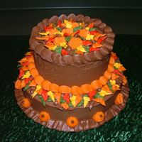 Fall Cake Choc cake frosted with choc with fall collered leaves.