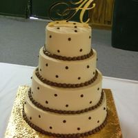 Brown And Ivory 4 Tier Wedding Cake 4 Tier's 6,8,10,12" White and choc. cakes.