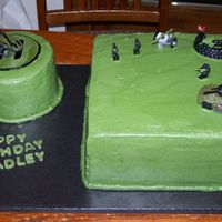 Cakes0001.jpg b/c frosting with toy figurines