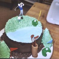 Golfer's Paradise! This was done as a grooms cake for a man who was a professional golf instructor! Chocolae Hazelnut cake with hazelnut choc. mousse filling...