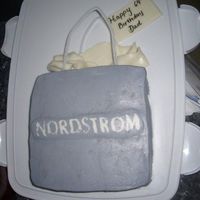Nordstrom Bag Chocolate Cake, Dulce de leche filling, buttercream icing.