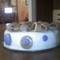 My Very First Cake I know it needs work, and more layers but it was my first time using fondant so I was trying to get the feel of it....more cakes to come...