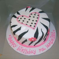 Teacher Birthday I made this for my daughter's teachers bday. Her school's theme this year has to do with zebras. White cake w/ buttercream...