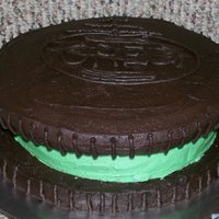 Mint Oreo Decided to try my hand at the oreo cookie cake. I decided to make mine mint. The "cookie" is chocolate cake with mint oreo pieces...
