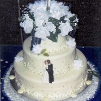 Vegas Wedding Cake Sorry about the picture, it's a scan of a photo. The top two layers are confetti cake, the bottom tier is white cake tinted red. The...