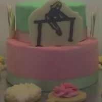 Caroline's Cake BC frosting, CT gymnastics. There was a crown cookie dusted with disco dust for a topper but did not get a pic of it.