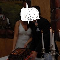 Cody's Cake Grooms cake for a friends wedding. Chocolate and ganache. This cake was a wedding present so I did not charge. The pistol pete cowboy is a...