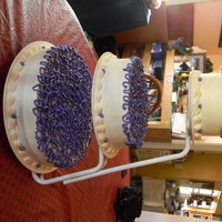 Purple Lace On Floating Tiers Purple lace with buttercream frosting on a floating tier set!