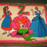 Disney Princess Cake This is the Disney Princess Cake I made for my daughter on her 2nd birthday. She loved the bright colors