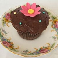 Pink Daisy Dense chocolate flourless cake with gumpaste pink daisy