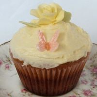 Rose & Butterfly Cupcake Hummingbird cupcake with cream cheese frosting. Rose and butterfly are gumpaste / sugarpaste