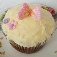 Butterfly Cupcake Hummingbird cupcake with cream cheese frosting. Butterfly and flowers are gumpaste / sugarpaste