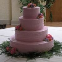 Cakes_For_Files_06-22.jpg chocolate cake roughly iced with pink buttercream; buttercream flowers