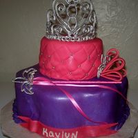 Princess Birthday Cake 12" Petal cake and 6" round cake covered in MMF. RI Tiara and scepter with fondant accents. Thank's to CC for tiara template...