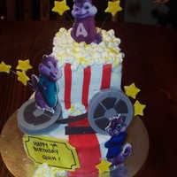 Alvin And The Chipmunks! 8 inch round, 6 inch round cut down. Marshmellow popcorn. Fondant accents.