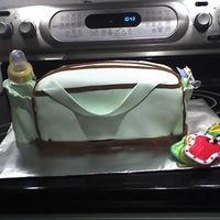 Baby Shower Yellow cake with fresh strawberry filling. BC covered with MMF. This was fun to make, I only wished I had the tool to make the quilted look...