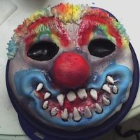 Scary Clown Cake My 16 yr old son wanted a Clown cake that resembled his halloween mask for his birthday. I was up for the challenge!It's just a yellow...