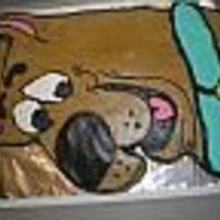Scooby Doo Hand carved from half sheet cake. Butter cream frosting.