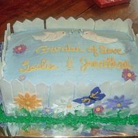 Garden Bridal Shower Fondant for fence and flowers. Cake is buttercream