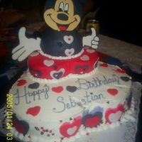 Mickey Valentine Birthday Cake This was my nephew's 1st Valentine B-day Cake. This is how it looks now with Mickey's face and hands. You may see that it has...