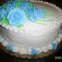 Blue Roses My graduation cake from my level 1 decorating cake classes. Made the roses of buttercream frosting.