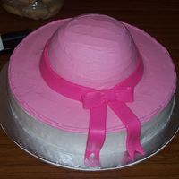 Pink Hat Cake 12" round base and a 6 c. Pyrex bowl for the top. Buttercream frosting and mmf ribbon/bow. This was my first attempt at making and...